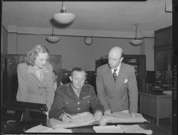 Lt. C.B. Roycroft (in uniform), Betty Harrold, George Cormack