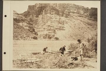 [two boats on shore]