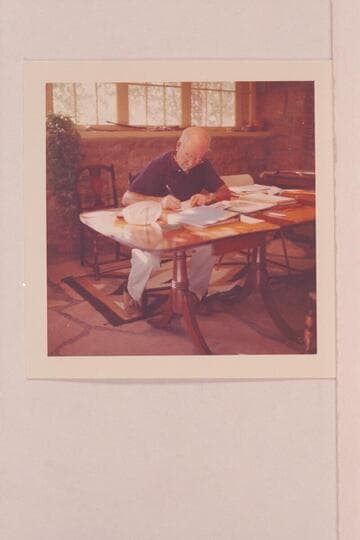 Dock Marston writes the notes of the trip near Navajo Mountain; dining room of Navajo Mountain Trading Post