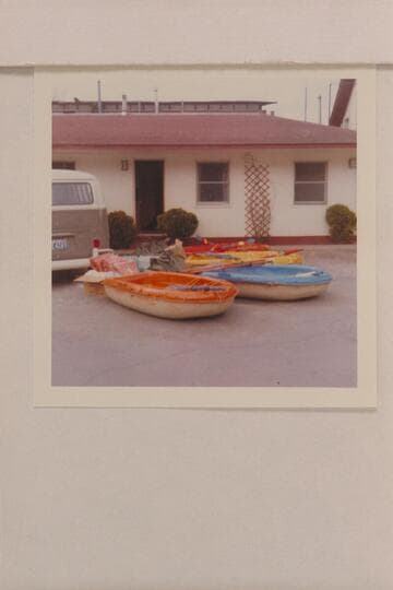 Sportyaks and gear unloaded from Volkswagon prior to Cataract Canyon transit.  Moab, Utah