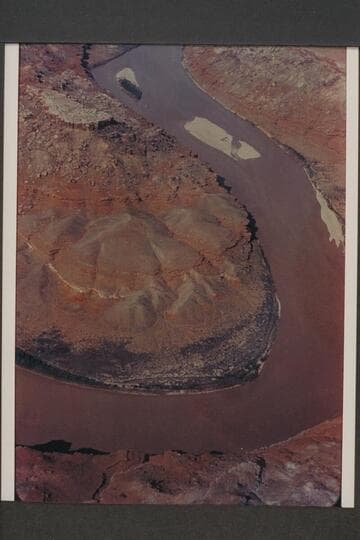 West in Glen Canyon from Mile 155.3 to Mile 158.  Preliminary gauge:  29,700 cfs