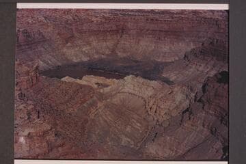 Down Butler or Red Lake Canyon to its mouth.  Spanish Bottom at opposite side of the river.  Approx. gauge:  30,000 cfs