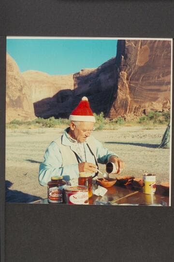 Aleson prepares breakfast before his wedding.  The Chapel