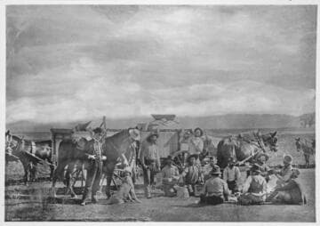 Grub time on Van Nuys Ranch, eating tin the field