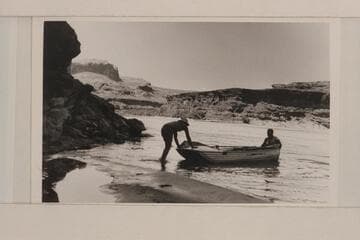 Reynolds' aluminum boat; confluence of San Juan and Colorado Rivers.  Bill Chenowith (AEC) and Jack Frost, Jr
