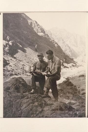 Norm Nevills and Jack Rottier; Eagle Bar Peak in background.  Snake River, Idaho