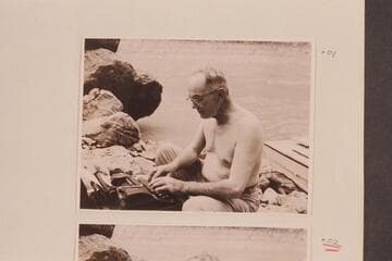 Randall Henderson types the daily story of his trip through the Grand Canyon in 1947