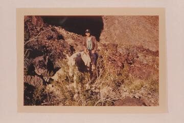Jimmy Jordan on an unfamiliar craft.  Riding up the Whitmore Trail on "Pete."  During the work of the Arizona Power Authority in studying dam sites