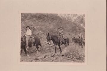 Marion Hudson (center) rides in at Bright Angel Creek