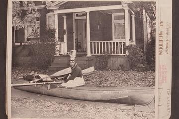 Leslie Jones [with 8mm movie camera mounted on his head]