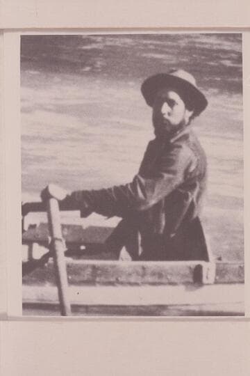 Charles Silver Russell at the oars of the "Utah."  Pipe Creek in the Grand Canyon