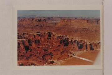 Monument Canyon; Standing Rock Basin. Junction Butte at upper left and the Henry Mountains on the skyline
