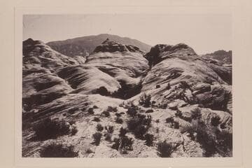 Cha Butte and Navajo Mountain from top of trail pass between Bald Rock Canyon and Cha Canyon. Butte 6069 is at upper right