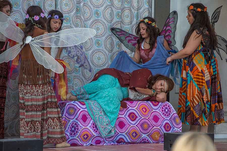 On April 17, 2015, students from the East Los Angeles Performing Arts Academy at Esteban E. Torres High School performed A Midsummer Night’s Dream on the South Terrace of the Huntington Art Gallery. Fairy Queen Titania, played by Mariah Gonzalez, was sung to sleep by her fairy attendants (left to right): Skyla de la Torre, Wendy Lopez, Jacey Caceres, Jasmine Tucker, and Alexa Mendoza. Photograph by Martha Benedict. On April 17, 2015, students from the East Los Angeles Performing Arts Academy at Esteban E. Torres High School performed A Midsummer Night’s Dream on the South Terrace of the Huntington Art Gallery. Fairy Queen Titania, played by Mariah Gonzalez, was sung to sleep by her fairy attendants (left to right): Skyla de la Torre, Wendy Lopez, Jacey Caceres, Jasmine Tucker, and Alexa Mendoza. Photograph by Martha Benedict.